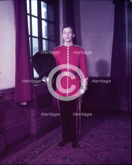 Guards officer in full dress uniform, London, c1953.  Creator: Arthur Charles Kirby Ware.