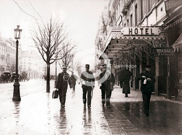 Guards on the street, Brussels, 1898.Artist: James Batkin