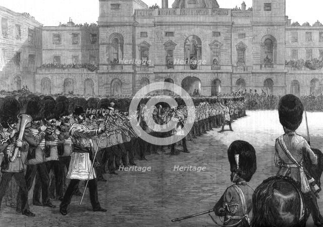 'Guards trooping the colours in St James's Park on Her Majesty's birthday', 1875. Artist: Unknown