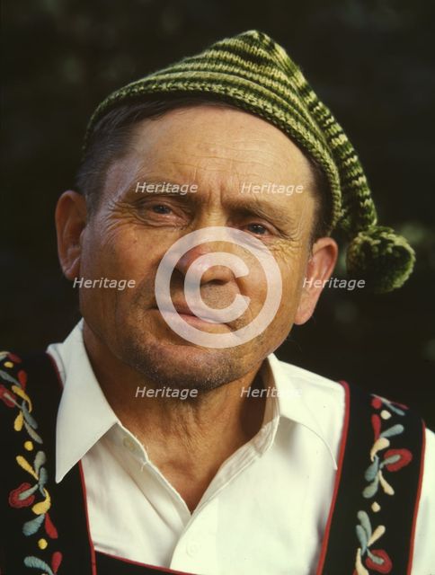 Guide at Little Norway, Blue Mounds, Wis., 1942. Creator: Arthur Rothstein.