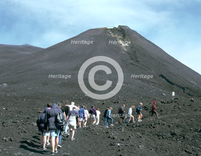 Guided tour to lava fields, Mount Etna, Sicily, Italy. Creator: Peter Thompson.