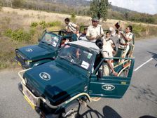 Guides in truck, Jim Corbett Tiger Reserve, Uttarakhand. Creator: Unknown