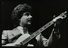 Guitarist Martin Taylor playing at the Forum Theatre, Hatfield, Hertfordshire, 1983. Creator: Denis Williams