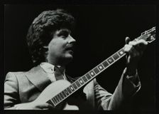 Guitarist Martin Taylor playing at the Forum Theatre, Hatfield, Hertfordshire, 1983. Creator: Denis Williams