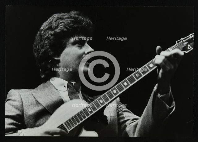 Guitarist Martin Taylor playing at the Forum Theatre, Hatfield, Hertfordshire, 1983. Creator: Denis Williams.