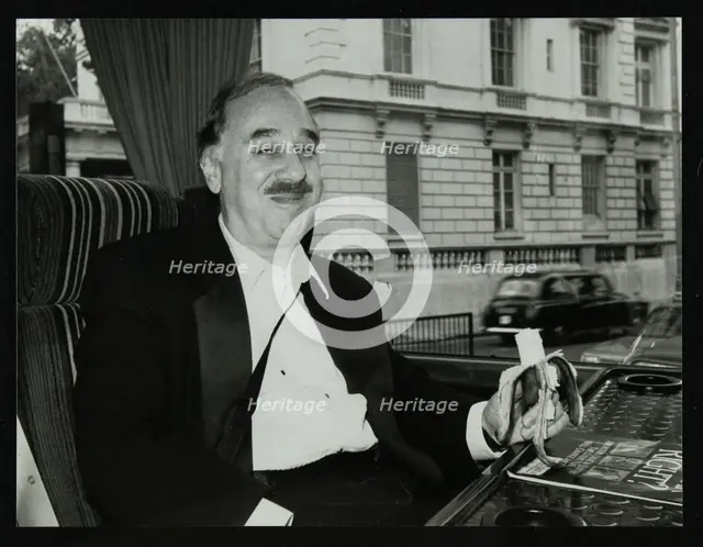 Guitarist Chuck Christiansen travelling by coach to the Royal Albert Hall, London, 28 May 1992. Creator: Denis Williams.