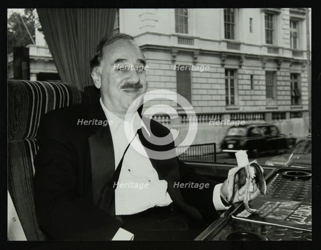 Guitarist Chuck Christiansen travelling by coach to the Royal Albert Hall, London, 28 May 1992. Artist: Denis Williams