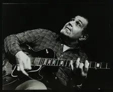 Guitarist Ike Isaacs playing at The Stables, Wavendon, Buckinghamshire. Creator: Denis Williams