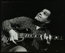 Guitarist Ike Isaacs playing at The Stables, Wavendon, Buckinghamshire. Creator: Denis Williams