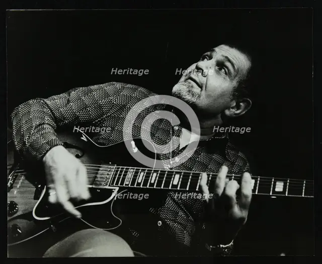 Guitarist Ike Isaacs playing at The Stables, Wavendon, Buckinghamshire. Creator: Denis Williams.