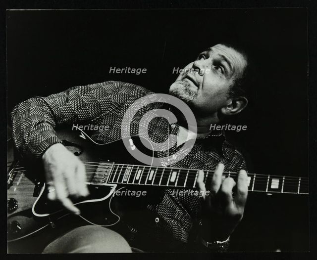Guitarist Ike Isaacs playing at The Stables, Wavendon, Buckinghamshire. Creator: Denis Williams.