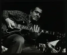Guitarist Ike Isaacs playing at The Stables, Wavendon, Buckinghamshire. Creator: Denis Williams