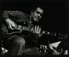 Guitarist Ike Isaacs playing at The Stables, Wavendon, Buckinghamshire. Creator: Denis Williams