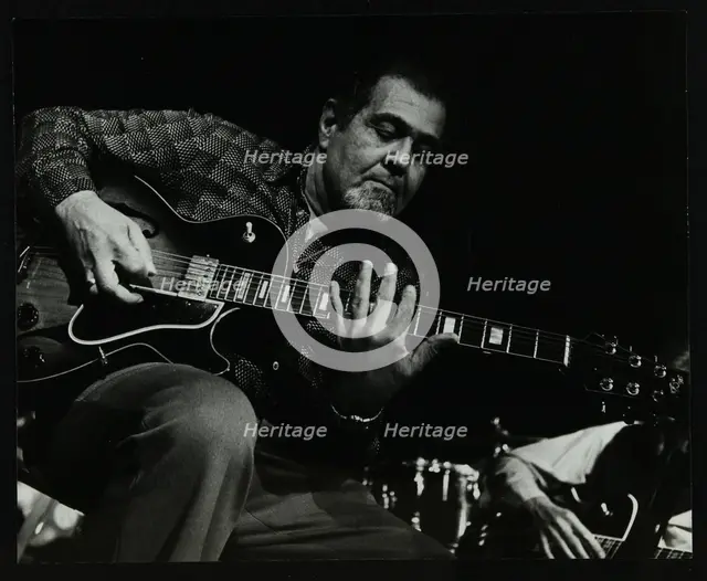 Guitarist Ike Isaacs playing at The Stables, Wavendon, Buckinghamshire. Creator: Denis Williams.