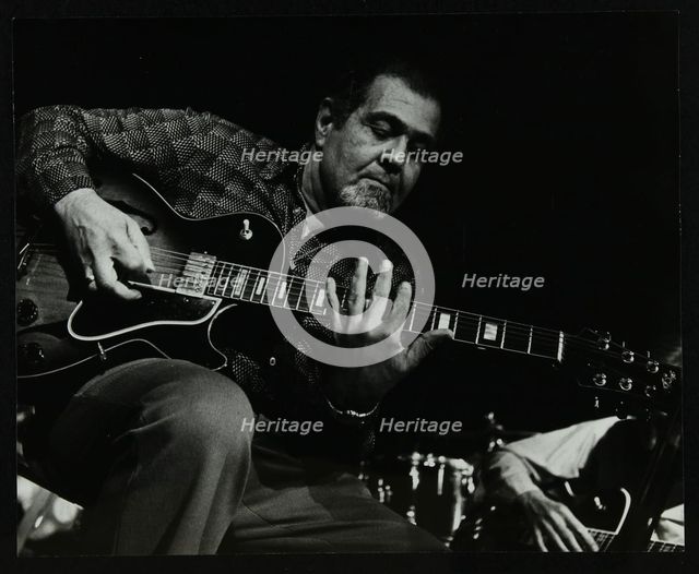 Guitarist Ike Isaacs playing at The Stables, Wavendon, Buckinghamshire. Creator: Denis Williams.