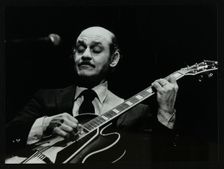 Guitarist Joe Pass on stage at the Forum Theatre, Hatfield, Hertfordshire, 12 November 1980. Creator: Denis Williams