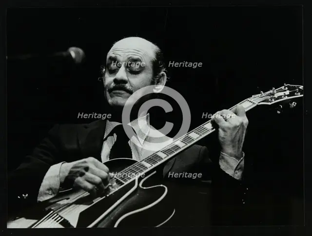 Guitarist Joe Pass on stage at the Forum Theatre, Hatfield, Hertfordshire, 12 November 1980. Creator: Denis Williams.