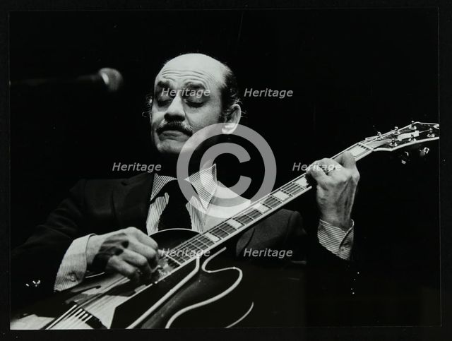 Guitarist Joe Pass on stage at the Forum Theatre, Hatfield, Hertfordshire, 12 November 1980. Creator: Denis Williams.