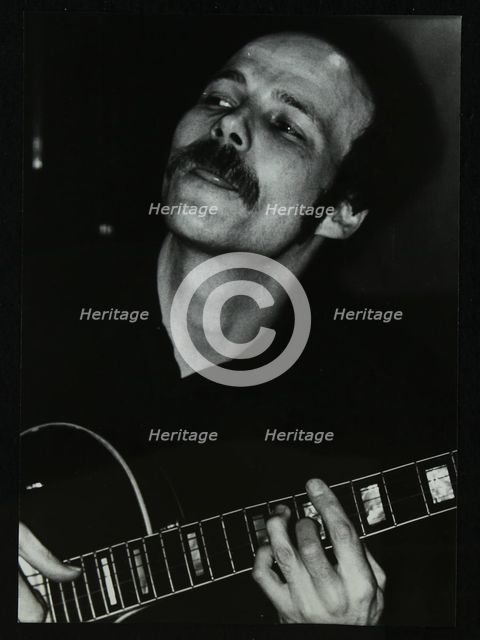 Guitarist John Coverdale playing at The Bell, Codicote, Hertfordshire, January 1984. Creator: Denis Williams.