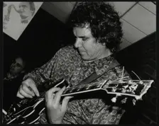 Guitarist John Etheridge playing at The Fairway, Welwyn Garden City, Hertfordshire, 9 November 2003. Creator: Denis Williams