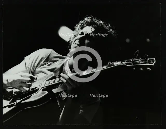 Guitarist John Etheridge playing at The Stables, Wavendon, Buckinghamshire. Creator: Denis Williams.
