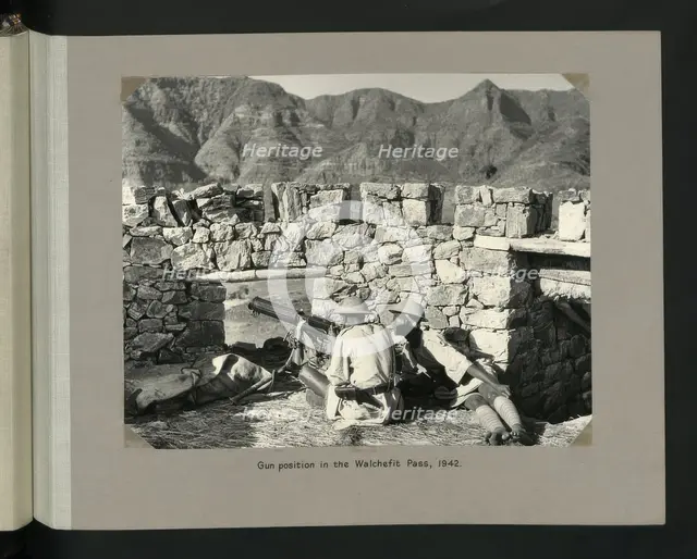 Gun position in the Walchefit Pass, 1942. Creator: Colonial Office.