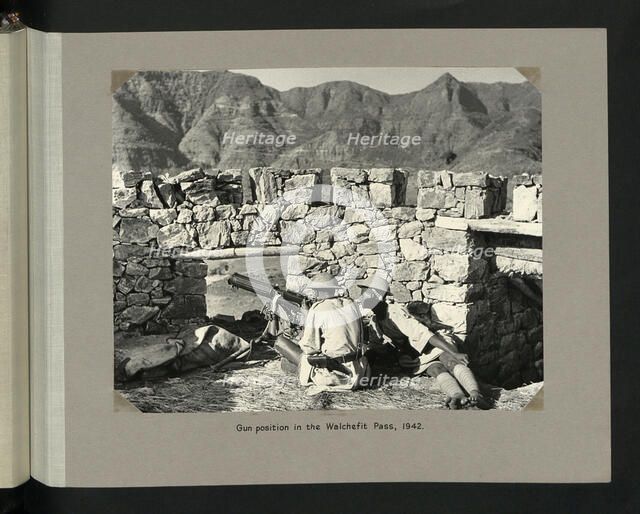 Gun position in the Walchefit Pass, 1942. Creator: Colonial Office.