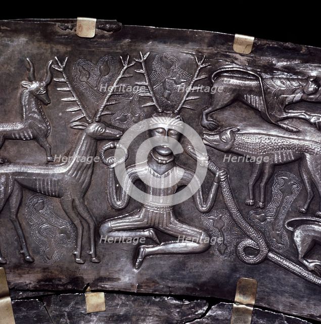 Gundestrup Cauldron, showing Celtic horned god Cernunnos with torc, Denmark, c100 BC. Artist: Unknown