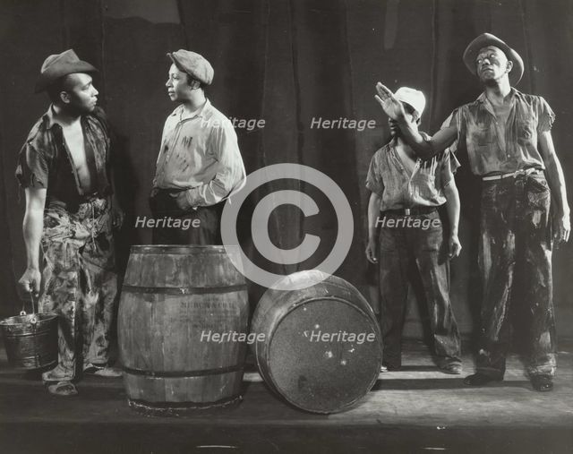 Gus Smith as Forty-Four explains the situation to his co-workers, 1936. Creator: Milton Meltzer.