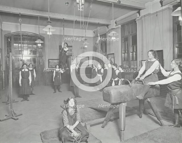 Gymnastics lesson, Laxon Street Evening Institute for Women, London, 1914. Artist: Unknown.