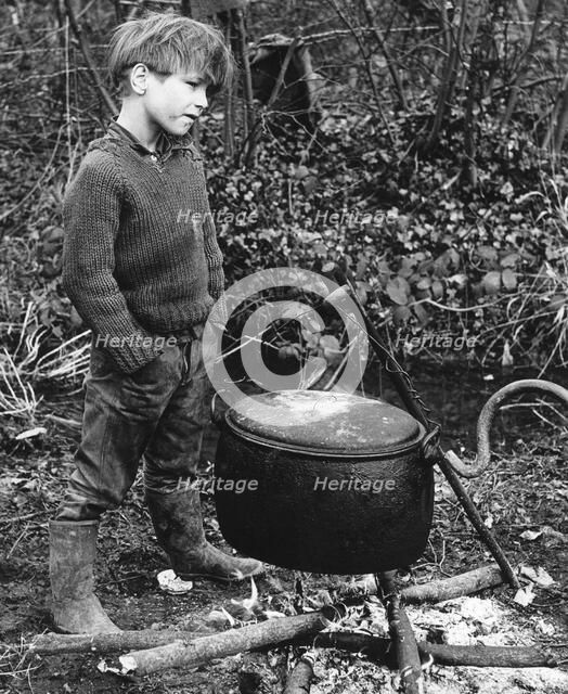 Gypsy boy with cauldron, 1960s.