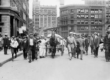D.H. Woolf and wife arriving in N.Y.C., 1910. Creator: Bain News Service