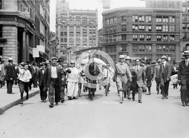 D.H. Woolf and wife arriving in N.Y.C., 1910. Creator: Bain News Service.