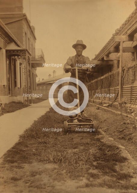 Dou Kee, Chinese servant, mowing the lawn, Dom Smith, Vladivostok, Russia, 1899. Creator: Eleanor Lord Pray.