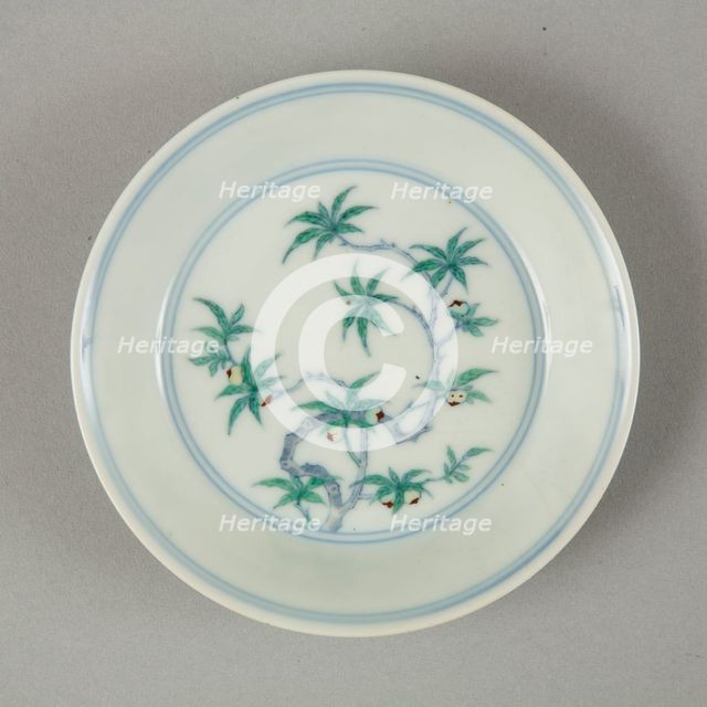 Doucai saucer with fruiting peach, late Kangxi period (1700-1722). Creator: Unknown.