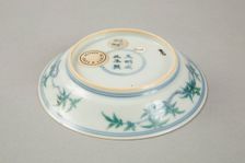 Doucai saucer with fruiting peach, late Kangxi period (1700-1722). Creator: Unknown