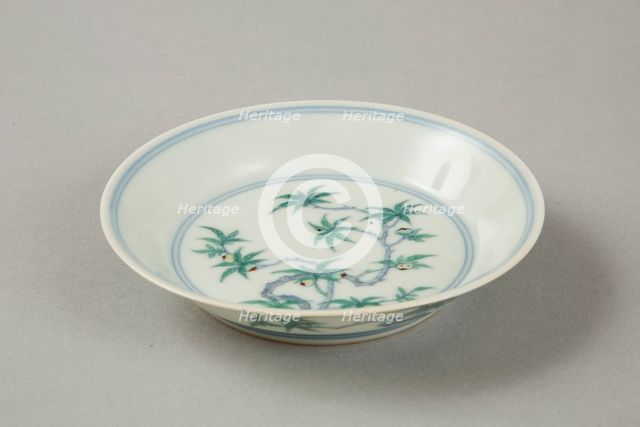 Doucai saucer with fruiting peach, late Kangxi period (1700-1722). Creator: Unknown.