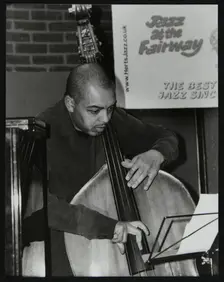 Double bassist Gary Crosby playing at The Fairway, Welwyn Garden City, Hertfordshire, 2004. Creator: Denis Williams