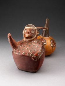 Double-Chambered Vessel Depicting a Figure and Trophy Heads, A.D. 500/800. Creator: Unknown