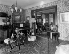 Douglas residence, parlors with arch between, Detroit, Mich., between 1905 and 1915. Creator: Unknown