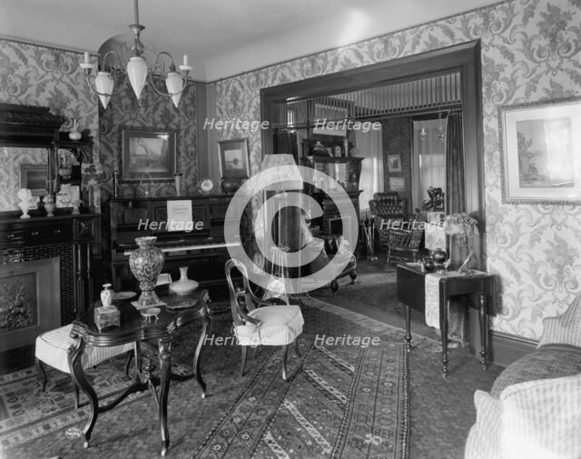 Douglas residence, parlors with arch between, Detroit, Mich., between 1905 and 1915. Creator: Unknown.