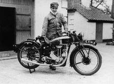 Donald Campbell outside a garage at Headley Grove, Surrey, 1938