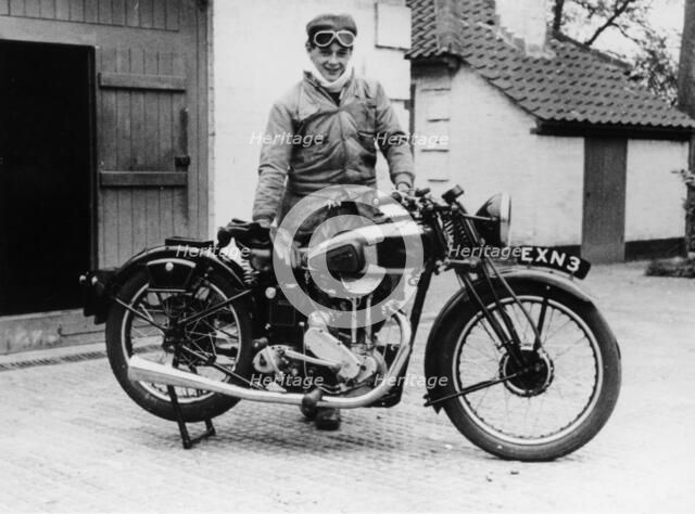 Donald Campbell outside a garage at Headley Grove, Surrey, 1938. Artist: Unknown