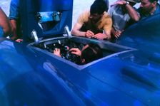 Donald Campbell in Bluebird CN7 cockpit at Lake Eyre 1963, Ken Norris on right. Creator: Unknown
