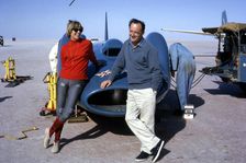 Donald Campbell with his wife Tonia and Bluebird CN7, Lake Eyre, Australia, 1964. Creator: Unknown