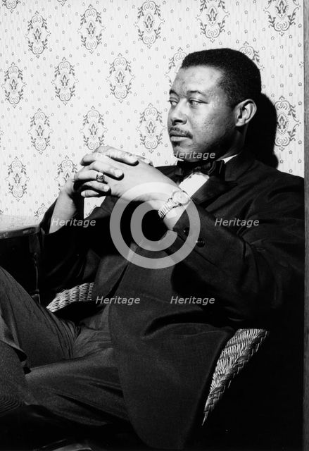 Donald "Duck" Bailey seated, early 1970s. Creator: Brian Foskett.