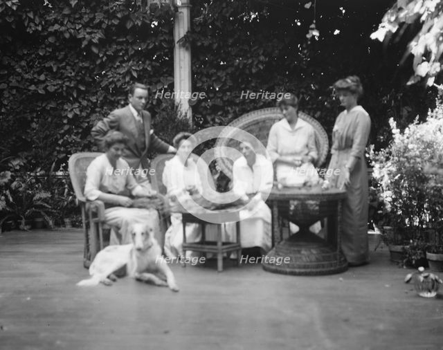 Donohoe, Mrs., and friends or family, portrait photograph taken outdoors, between 1906 and 1915. Creator: Arnold Genthe.