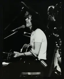 Donovan in concert at the Forum Theatre, Hatfield, Hertfordshire, 10 October 1981. Creator: Denis Williams