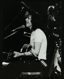 Donovan in concert at the Forum Theatre, Hatfield, Hertfordshire, 10 October 1981. Creator: Denis Williams