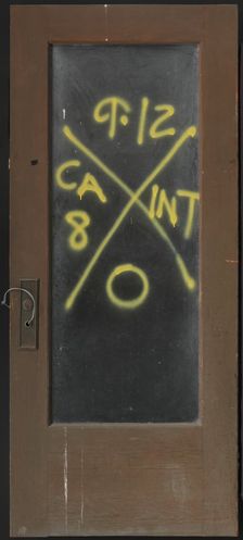 Door with rescue markings from Hurricane Katrina, before 2005; altered September 12, 2005. Creator: Unknown
